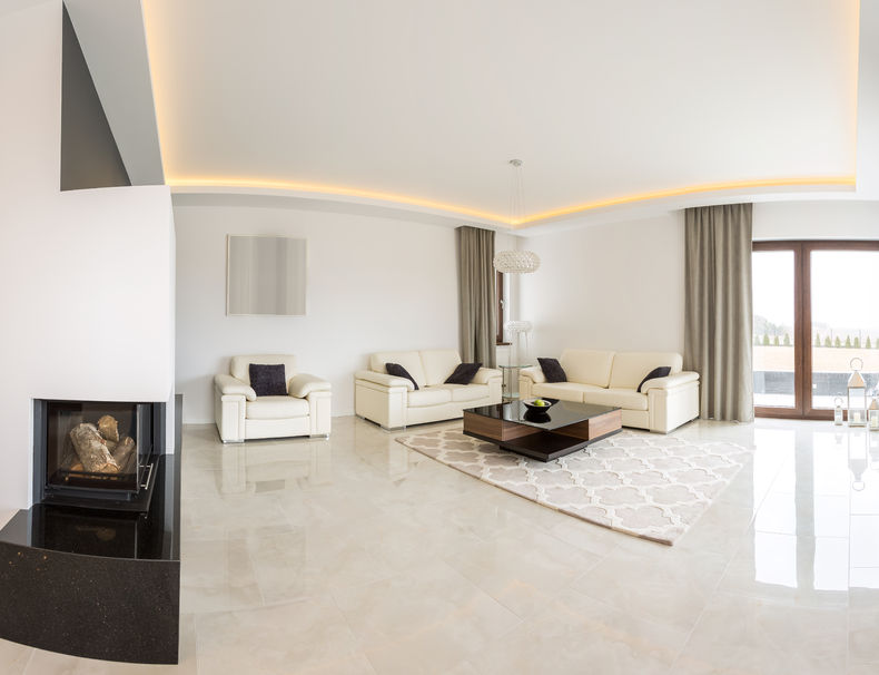 43691884 - spacious bright living room with fireplace and marble floor