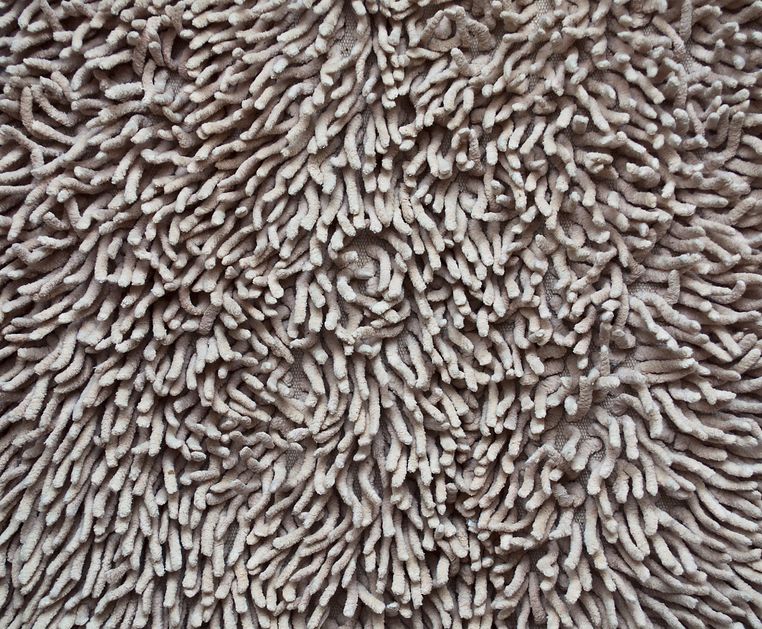 12093247 - a beige carpet texture