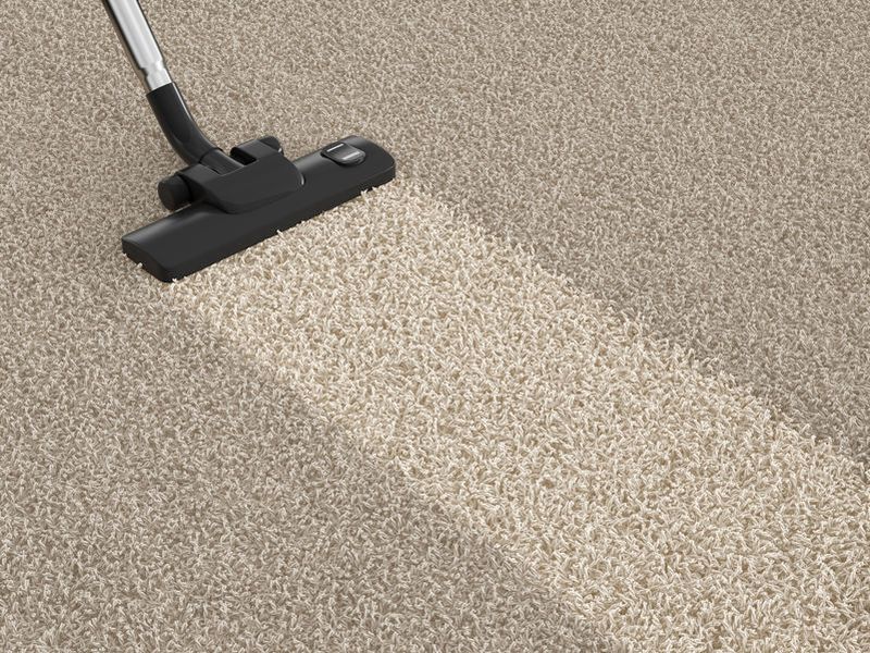36570084 - vacuum cleaner  on the dirty carpet. house cleaning concept