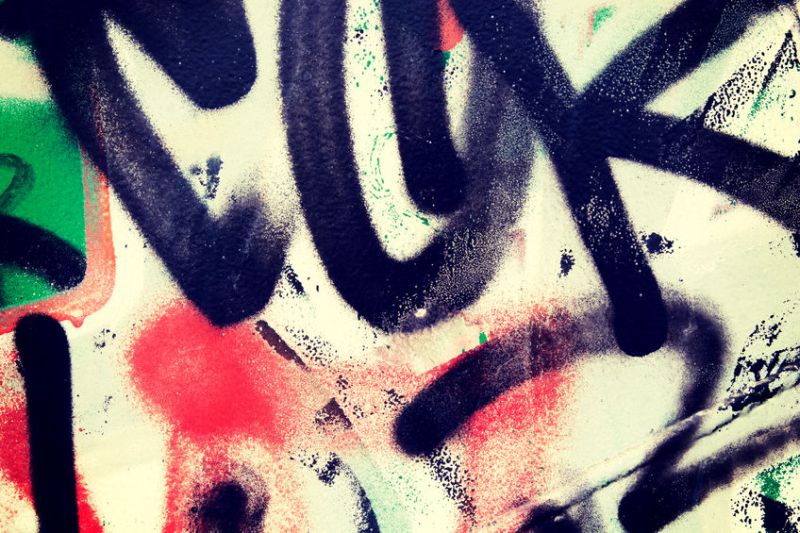 27727795 - abstract metal wall with graffity as background